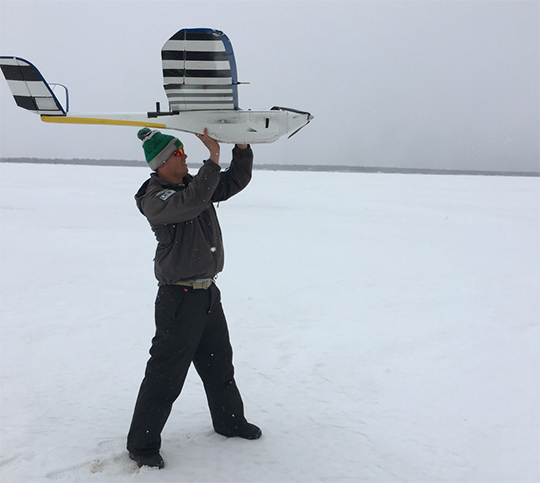 A crewmember from North Dakota preparing to launch a vehicle during May 2017 testing